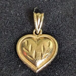 14 k gold heart charm marked Ma